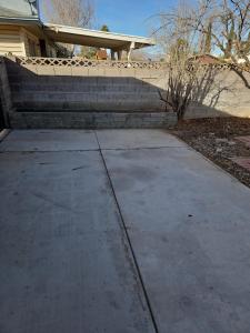 a sidewalk in front of a house with stairs at Cozy Quiet Quarters! in Las Vegas