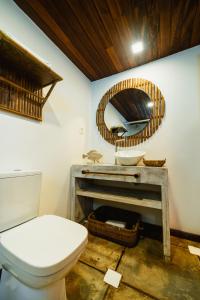 a bathroom with a white toilet and a sink at Pousada do Joab - Fernando de Noronha in Fernando de Noronha +74 photos