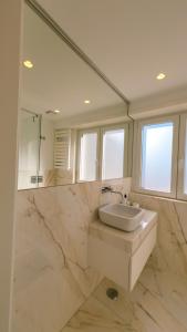 Ένα μπάνιο στο Saldanha cozy apartament