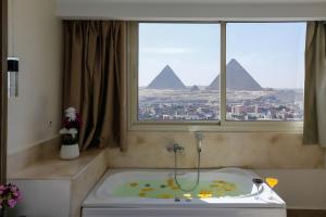 Φωτογραφία από το άλμπουμ του Pyramids View& Grand Museum With Jacuzzi On Eleven Floor & Roof Restaurant στο Κάιρο +69 φωτογραφίες