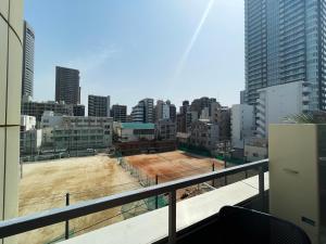 Nespecifikovaný výhled na destinaci Ósaka nebo výhled na město při pohledu z apartmánu