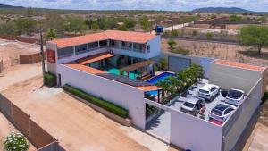 an aerial view of a house with a parking lot at Espaço d Lurdes in Piranhas