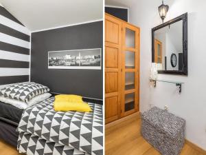 a bedroom with a bed and a mirror at House in Fa ana near Rock Beach in Fažana