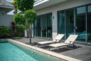 Πισίνα στο ή κοντά στο Tropical 4 Bedroom Pool Villa