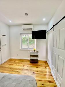 TV o dispositivi per l'intrattenimento presso Casa Zun Zun Roatan