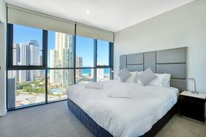 Postel nebo postele na pokoji v ubytování Ruby Apartment Gold Coast + 37 fotografií