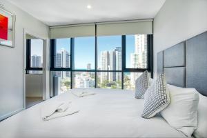 Postel nebo postele na pokoji v ubytování Ruby Apartment Gold Coast