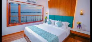 Ένα ή περισσότερα κρεβάτια σε δωμάτιο στο Cosy Boathouse +6 φωτογραφίες