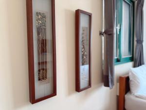 سرير أو أسرّة في غرفة في Azumaya guest house