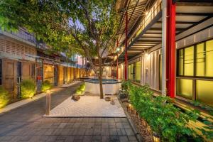 Κήπος έξω από το SHIN Hostel Changphuak ChiangMai