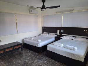 A bed or beds in a room at Casa Breizh
