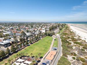an aerial view of a beach and a city at Glenelg Hideaway Bliss in Glenelg