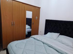 Postel nebo postele na pokoji v ubytování EKA homes
