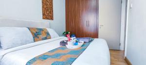 Ένα ή περισσότερα κρεβάτια σε δωμάτιο στο Sky View Kilimani