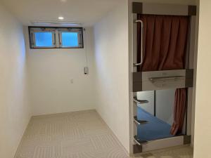 Postel nebo postele na pokoji v ubytování HOTEL PAiKAJi