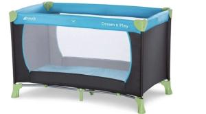 a bed with a blue and black bed frame at Ferienwohnung Paradies in Nollingen