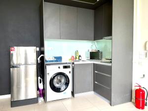 Kuchyň nebo kuchyňský kout v ubytování Cozy Tamarind Suites
