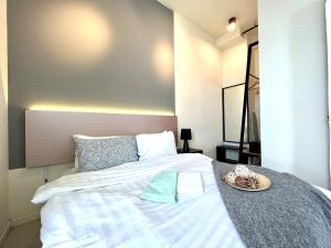 Postel nebo postele na pokoji v ubytování Cozy Tamarind Suites