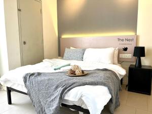 Postel nebo postele na pokoji v ubytování Cozy Tamarind Suites