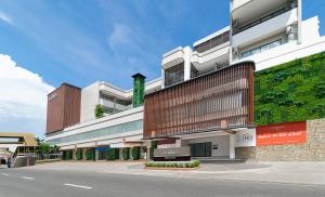 a rendering of a building on the side of a street at Citadines Amigo Iloilo in Iloilo City