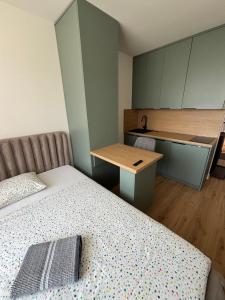 Ένα ή περισσότερα κρεβάτια σε δωμάτιο στο Central Apartment Kriva 18