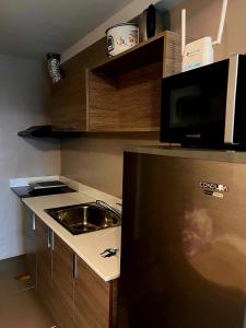 Η κουζίνα ή μικρή κουζίνα στο Monte Carlo Residenze