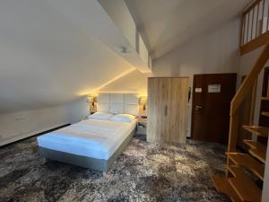 Postel nebo postele na pokoji v ubytování Appartment-Hotel-Hölzl
