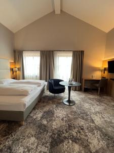 Postel nebo postele na pokoji v ubytování Appartment-Hotel-Hölzl