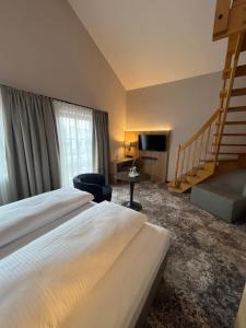 Postel nebo postele na pokoji v ubytování Appartment-Hotel-Hölzl