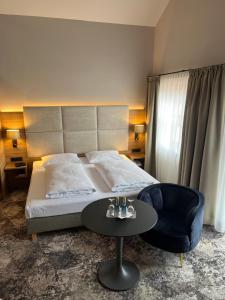 Postel nebo postele na pokoji v ubytování Appartment-Hotel-Hölzl