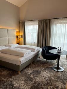 Postel nebo postele na pokoji v ubytování Appartment-Hotel-Hölzl