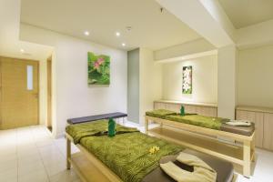 Area soggiorno di MaxOneHotels at Bukit Jimbaran