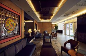 Posezení v ubytování Estadia Hotel