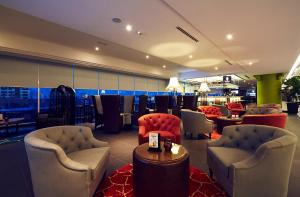 Posezení v ubytování Estadia Hotel