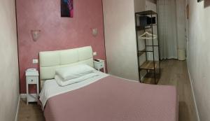 Postel nebo postele na pokoji v ubytování Hotel PRINCIPE AMEDEO