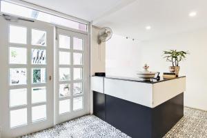 A kitchen or kitchenette at Hotel O Garden View