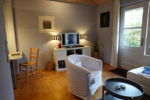 TV a/nebo společenská místnost v ubytování Ferienwohnung Anna