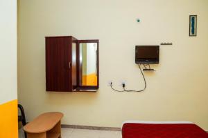 TV a/nebo společenská místnost v ubytování Shree Rajkamal Residency