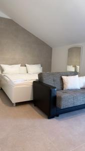 Ένα ή περισσότερα κρεβάτια σε δωμάτιο στο Villa Jadro