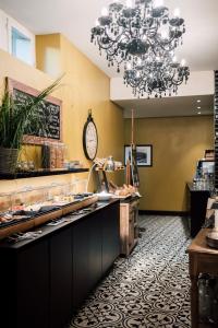 Kuchyň nebo kuchyňský kout v ubytování Blue City Boutique Hotel