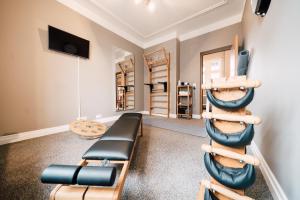 TV a/nebo společenská místnost v ubytování Blue City Boutique Hotel