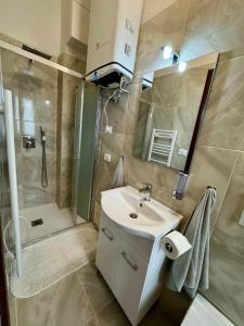 Koupelna v ubytování Valentina's Verona + 11 fotografií