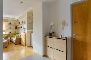 Η κουζίνα ή μικρή κουζίνα στο Lumina luxury 3-rooms apart in Warsaw