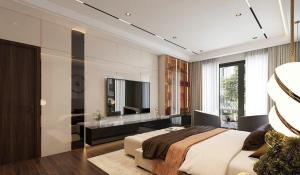 a bedroom with a bed and a flat screen tv at FLC Sea Tower Quy Nhơn-Codotel 5 Sao-Mặt Biển Quy Nhơn-Trung Tâm Thành Phố in Quy Nhon