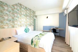 TV a/nebo společenská místnost v ubytování Liga Hotel