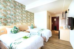 Postel nebo postele na pokoji v ubytování Liga Hotel