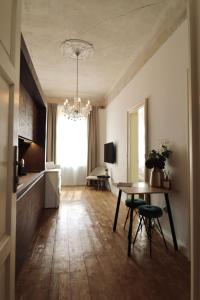 TV a/nebo společenská místnost v ubytování Apartmá Hilda 1905