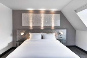Radisson Blu Hotel, Edinburgh City Centre客房内的一张或多张床位