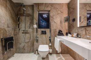 A bathroom at Radisson Collection Hotel, Tallinn