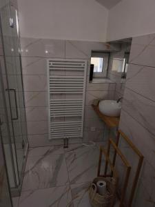 Koupelna v ubytování Apartmány Ústup
